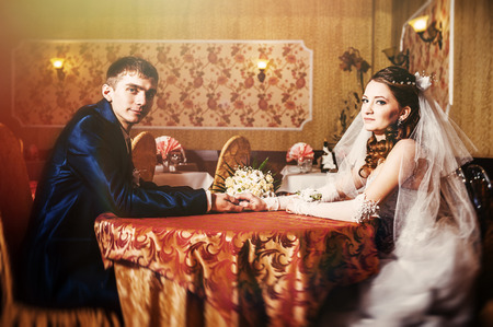 Love you honey.  Newly wed couple drinking cappuccino in cafe.の写真素材