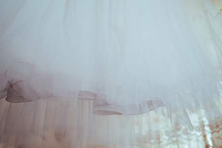 Closeup Detail of a wedding white fashion dressの写真素材