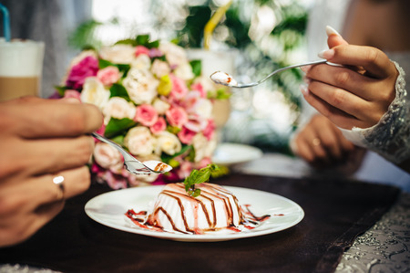 Charming bride and groom on their wedding celebration in a luxurious restaurant.の写真素材