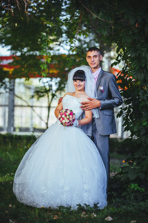 Loving wedding couple outdoor.の写真素材