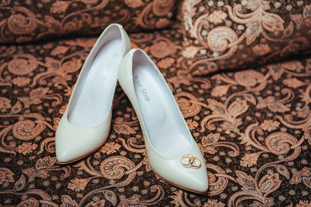 bridal shoes bride garter and wedding ringsの写真素材