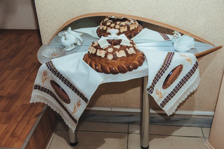 The first meeting of the bride and groom on the wedding day. Emotions newlyweds before the wedding ceremony. Bride and groom look at each other, hugging and kissingの写真素材
