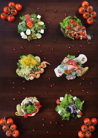 Gourmet Restaurant Food - Delicious Smoked meat, fish and Vegetable Salads. Luxury Appetizer Restaurant Foodの写真素材