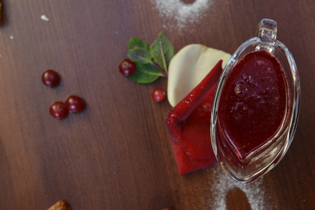 souse top view on rustic wooden table around empty white plate, round frame, top view. Fresh vegetables mushrooms greens and spices around free copyspace. Healthy food concept.の写真素材