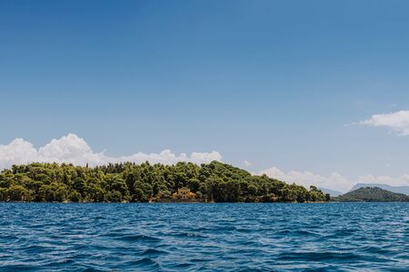 Small uninhabited tropical island in the ocean, Maldivesの写真素材