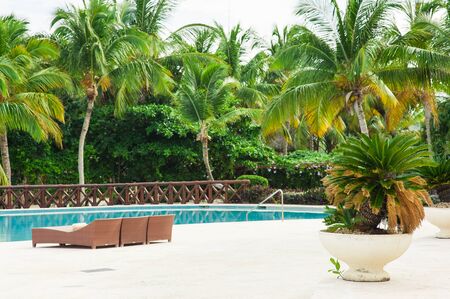 Pool bed at the blue swimming pool in Tropical Paradise. Dominican Republic, Seychelles, Caribbean, Mauritius, Philippines, Bahamas. Relaxing on remote Paradise beach.の写真素材