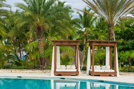 Pool bed at the blue swimming pool in Tropical Paradise. Dominican Republic, Seychelles, Caribbean, Mauritius, Philippines, Bahamas. Relaxing on remote Paradise beach.の写真素材