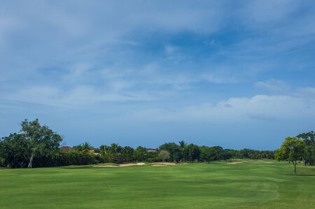 Tropical Paradise. Dominican Republic, Seychelles, Caribbean, Mauritius, Philippines, Bahamas. a green tropical forest. Pathway in tropical park. Golf Course in Tropical Paradise. Summertime holyday in Dominican Republicの写真素材