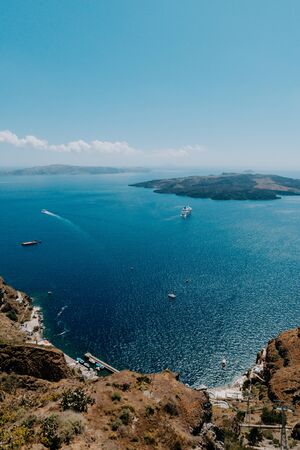 Oia Santorini Greece famous with romantic and beautiful sunsets. Oia village in Santorini island.Greeceの写真素材