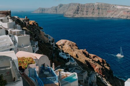 Oia Santorini Greece famous with romantic and beautiful sunsets. Oia village in Santorini island.Greece.の写真素材