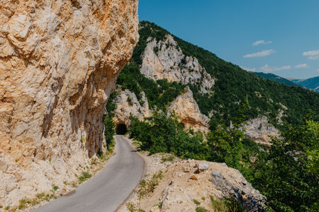 Picturesque landscape with mountain road. Old road with tight serpentines on the mountainsの写真素材