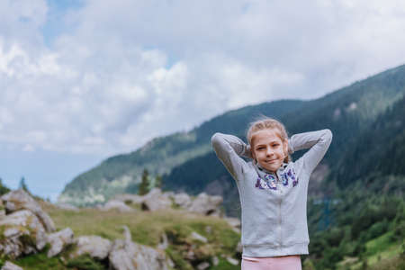 Young girl posing in parkの写真素材