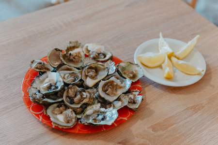 Fresh oysters with limeの写真素材