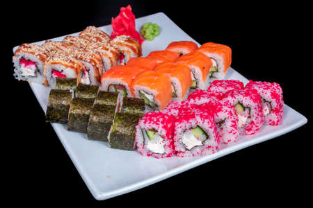 Japanese Cuisine - Sushi Roll with Shrimps and Conger, Avocado, Tobiko and Cheese. sushi rolls tempura,japanese food style ,Traditional Japanese cuisine, Crunchy Shrimp Tempura Rollの写真素材