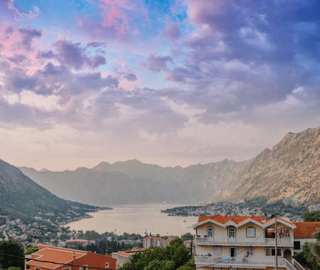 Sunset, beautiful landscape with silhouettes of trees. Travel concept. Montenegro, Kotor Bay. Sunset at Kotor Bay Montenegro. View of the sunset in Boko-Kotor Bay in Montenegro.の写真素材