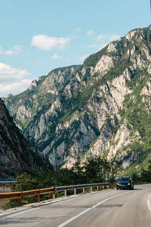 Empty route and small tunnel in mountainの写真素材