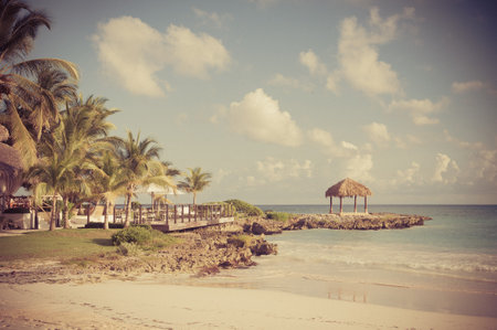 Tropical Paradise. Dominican Republic, Seychelles, Caribbean, Mauritius, Philippines, Bahamas. Relaxing on remote Paradise beach. Vintage.の写真素材