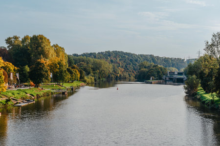Aerial drone birds eye view of sport canoe operated by 2 young men in turquoise clear waters. Kayaking on the river. Two young men sit in kayaks. The concept of water entertainment.の写真素材