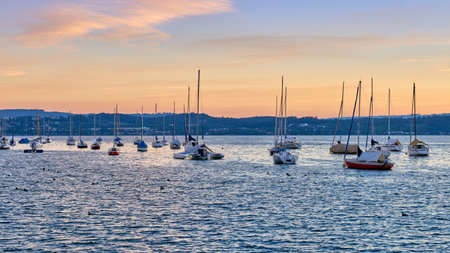 Bodensee Lake Sunrise Panorama. Morning Sunlight Over Tranquil Waters.の写真素材
