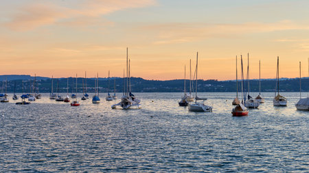 Bodensee Lake Sunset Panorama. Evening Sunlight Over Tranquil Waters. Sunset Vista at Lake Bodensee...