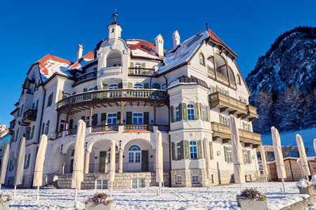 Majestic Alpine Palace Blends Jugendstil and Baroque Elements in Stunning Mountain Setting Ornate...