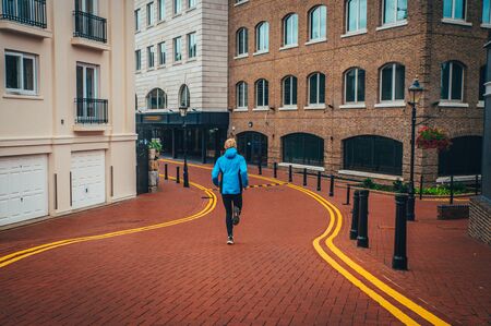 Athlete run in Streets of Londonの写真素材