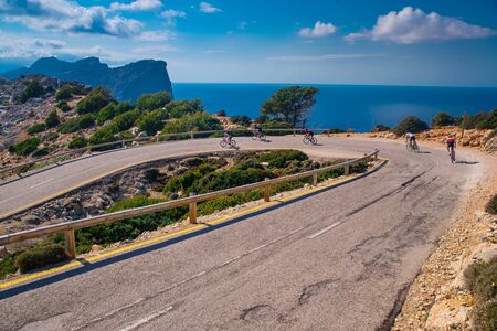 Road bikers on the road on Balearic Islands..の写真素材