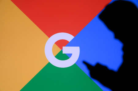 NEW YORK, USA, 25. MAY 2020: Google company for Internet interests Young boy chat on mobile phone....