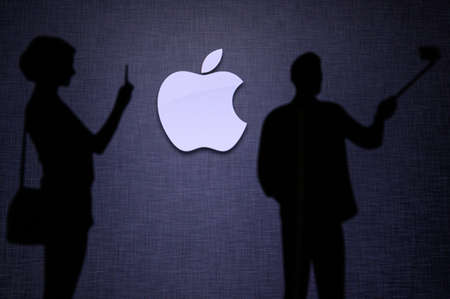 NEW YORK, USA, 25. MAY 2020: Apple American multinational technology company Man and Woman taking a...