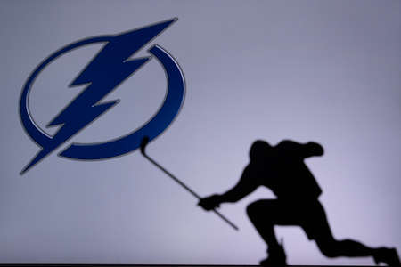 TORONTO, CANADA, JULY 17: Tampa Bay Lightning Logo. Professional NHL hockey player celebrate goal. Silhouette photo, Edit spaceのeditorial素材