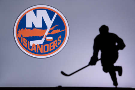 TORONTO, CANADA, JULY 17: New York Islanders Concept photo. silhouette of professional NHL hockey...