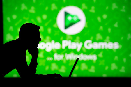 USA, NEW YORK CITY, JANUARY 30, 2023: Google Play. Unleashing the Power of the Internet: Silhouetted Man Uses Innovative App to Browseのeditorial素材
