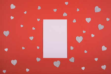 Red background many hearts place for text white paper. Valentines day, mothers day, holiday.の写真素材