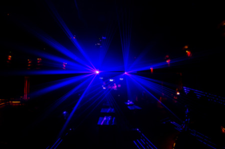 blur Abstract image of disco lights.lights in club party.
