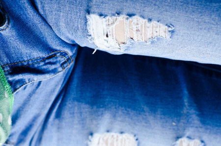 Jeans background texture,Denim jeans texture or denim jeans background with old torn. Old grunge vintage denim jeans. Stitched texture denim jeans background of fashion jeans design. Dark edged.の写真素材