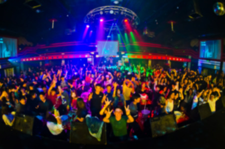 night club concert party enjoy of music dancing sound,hands up in the air.の写真素材