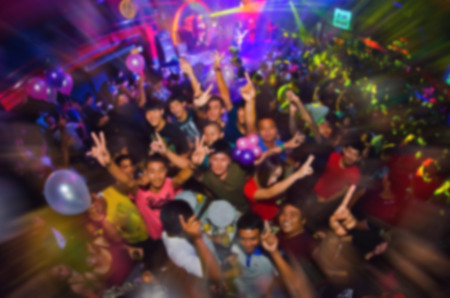 night club concert party enjoy of music dancing sound,hands up in the air.