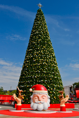 Star on Christmas tree,Christmas tree lights reflecting from glass balls and mirrorの写真素材