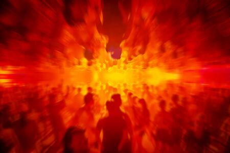 Lighting in club party,blur silhouettes of happy people crowd having fun and dancing in club party.