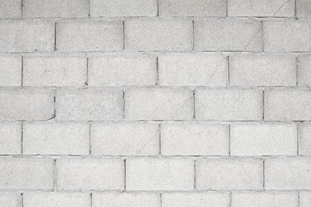 Old cement blocks wall texture and background.