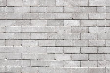 Old cement blocks wall texture and background.