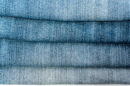 Close-up old Jeans trousers stackの写真素材