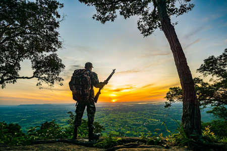 Khon Kaen, Thailand - August 8, 2021 : Forester or forest ranger stand guard in Phu Wiang National Park in Wiang Kao Districtのeditorial素材