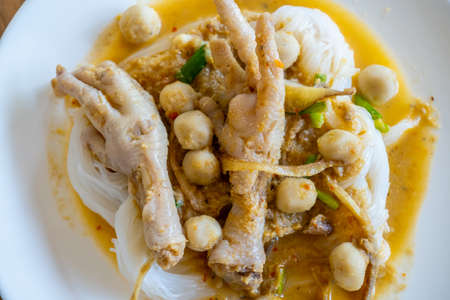"Kanom Jeen" Thai rice vermicelli noodle with soup coconut milk curry paste - Thai traditional menuの写真素材