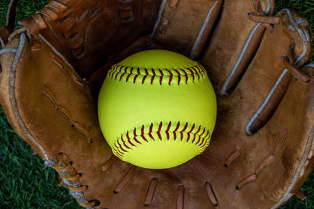 The softball ball in the softball glove has space for text.の写真素材