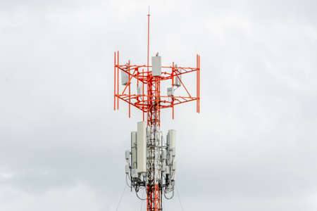 Telecommunication tower of 5G and 5G cellular. Macro Base Station. 6G radio network telecommunication equipment with radio modules and smart antennas mounted on a metalの写真素材