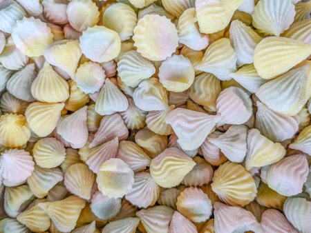Colorful candy background and texture.pastel colors Thai chewy coconut candy or Allure candy (Ar Lua), famous Thai dessertの写真素材