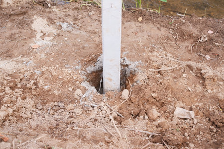 Reinforcement Steel Rebar Cage and Concrete Wall Foundation during Construction. Structural...