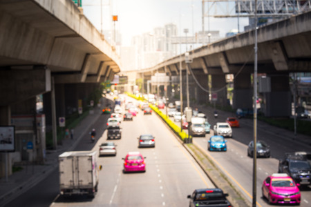 Car on highway in traffic thailand,Blur focus of the lens