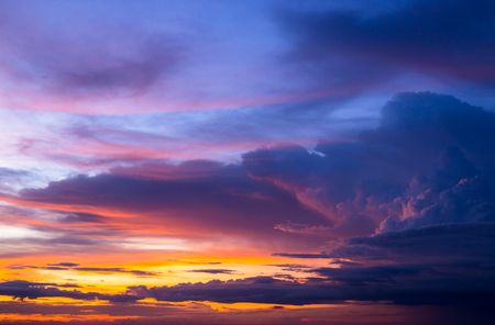 Colorful of sky and cloud in sunset,and twilight,with cityscape in the eveningの写真素材